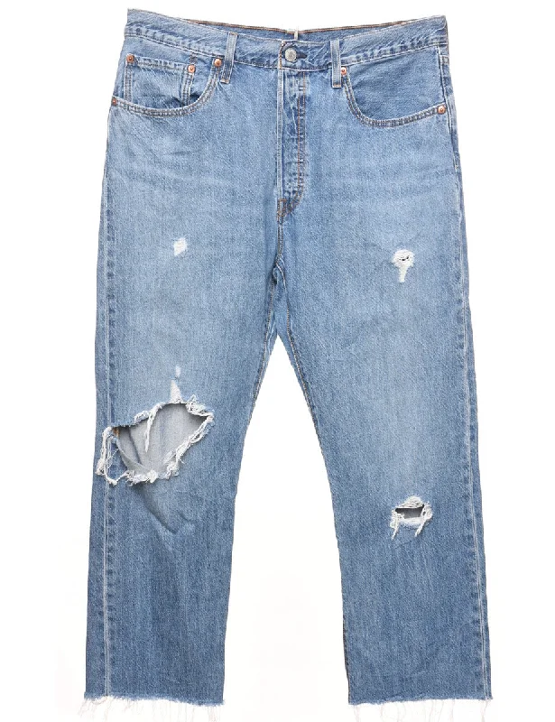 Distressed Light Wash Ripped Levi's Jeans - W33 L26